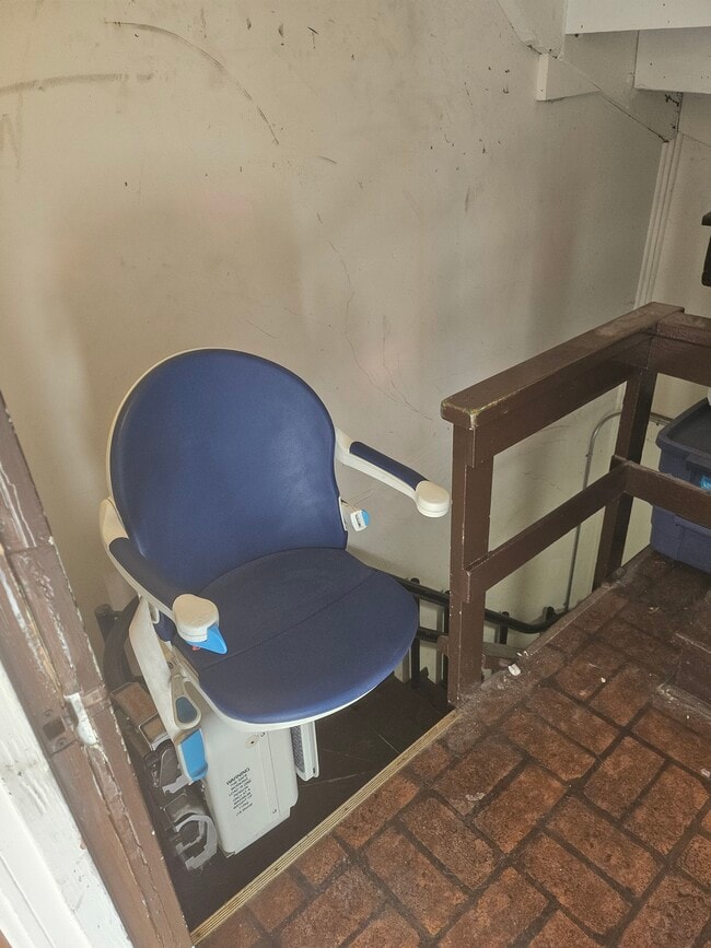 Rear stair lift - 2974 S Loomis St Unit 1st Floor (front building)