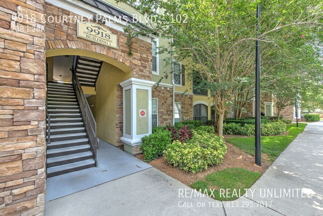 Building Photo - 9918 Courtney Palms Blvd Unit 102