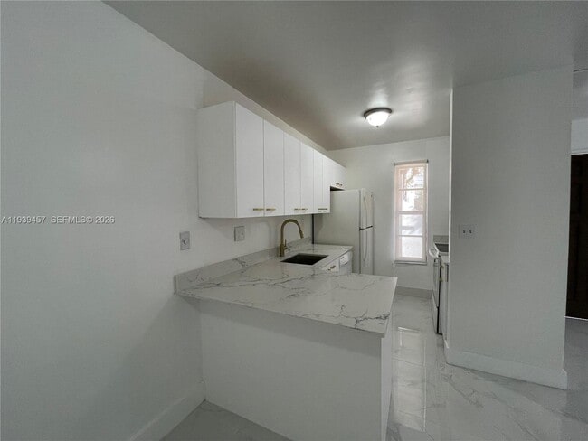 Building Photo - 7450 SW 153rd Pl Unit 104-2