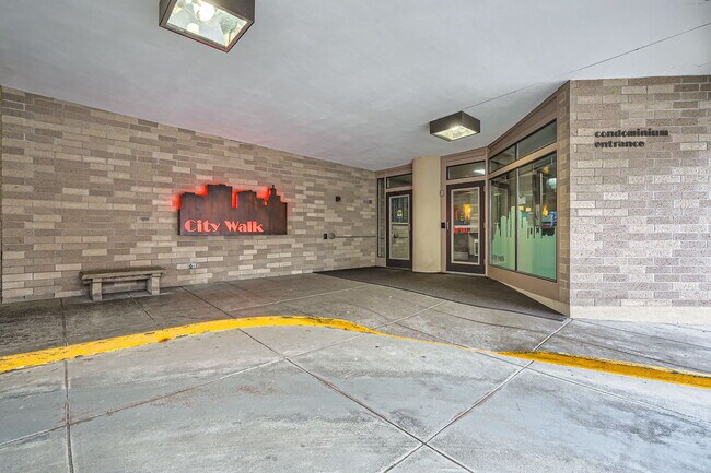 Secured entry with on-site security - 66 9th St E Unit 1305