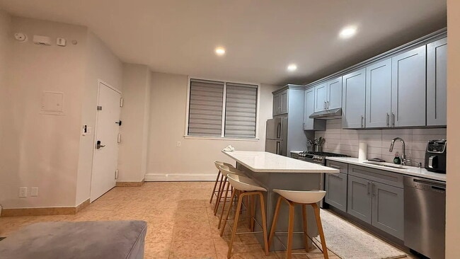 Photo - "Charming 1-Bedroom Furnished Apartment with Hardwood Floors in Queens – 750 Sq Ft of Comfort!"