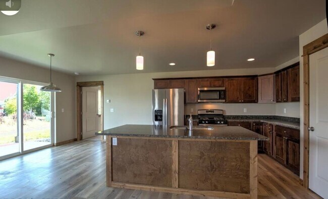 Photo - Spacious 3BR/2BA Home in Quiet Belgrade Neighborhood with Fenced Backyard & Garage