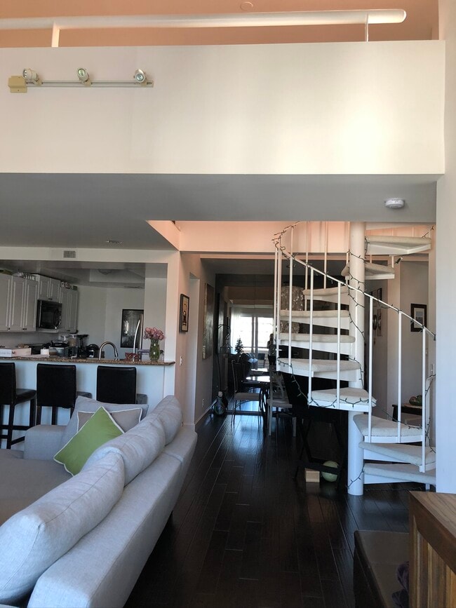 Spiral staircase leading up to loft/sundeck - 1808 Manning Ave Unit 302
