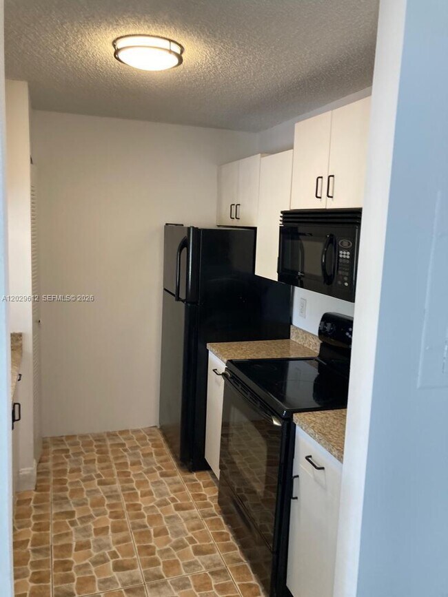 Photo - 1701 Village Blvd Unit 107
