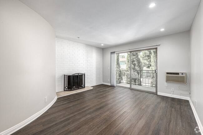 2BR, 1BA - 950SF - Living Room - French Court Apartments