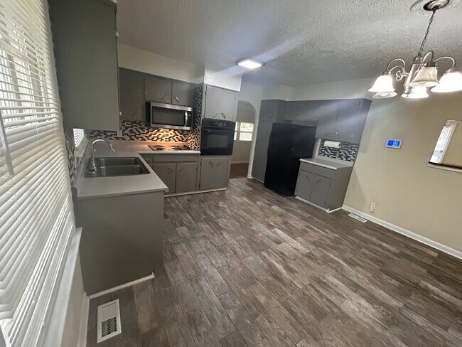 Photo - Beautiful 3 BED- 2BA with bonus room fenced in yard