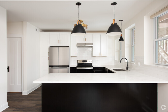 Building Photo - 1044 Asbury Ave Unit 2N Rental