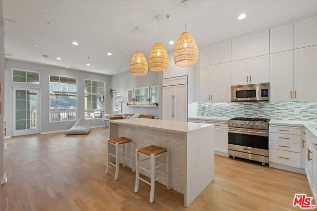 Building Photo - 13020 Pacific Promenade Unit 401