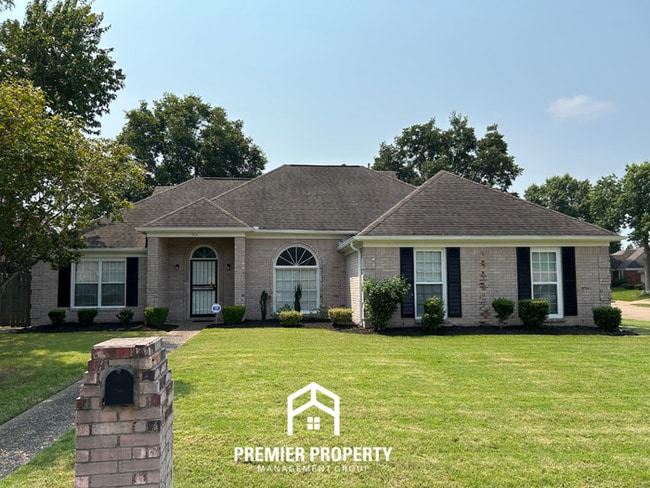 Building Photo - Spacious 3BR/2BA Near Southwind | 1,958 Sq Ft, Brick Fireplace, 2-Car Garage & Quiet Cove