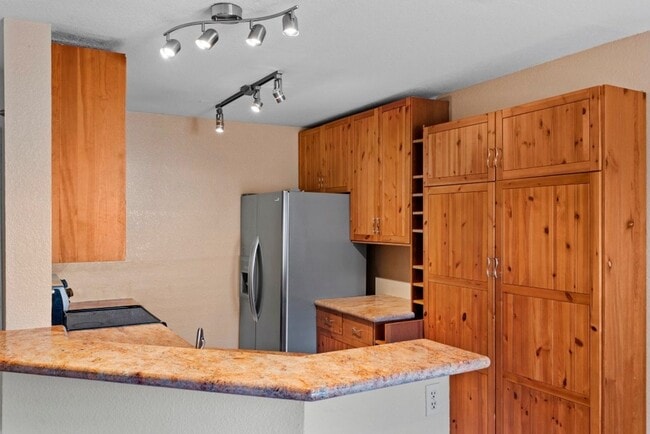 Photo - Stylish 1-Bed Condo with Balcony, Garage & Resort-Style Amenities in Mira Mesa Unit 74