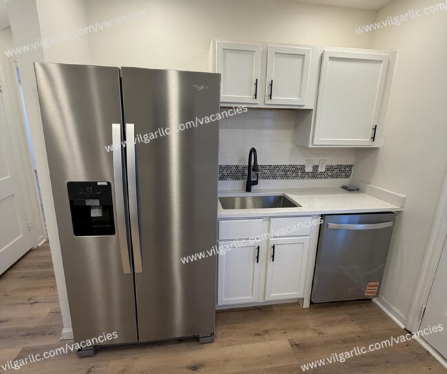 Photo - Spacious 4-Bedroom • 2-Bathroom Single-Family Home