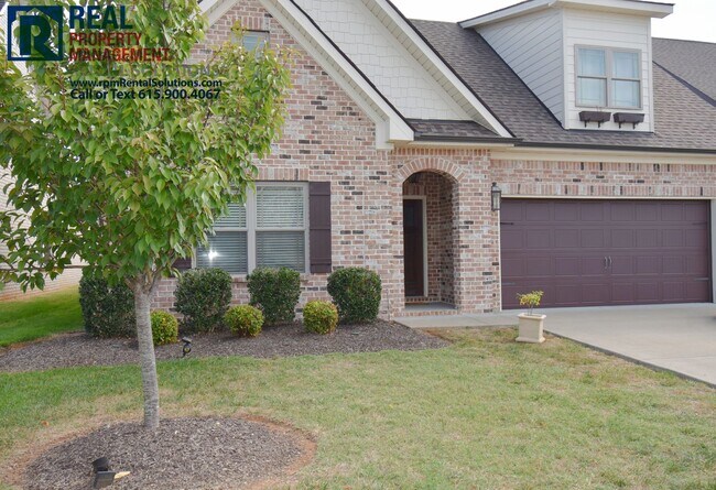 Photo - All brick 4 bedroom home plus Bonus room! Garage and covered patio!