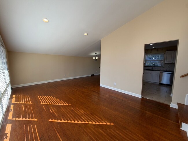 Photo - Freshly Painted Split-Level Home with Large Deck & Lawn Care Included