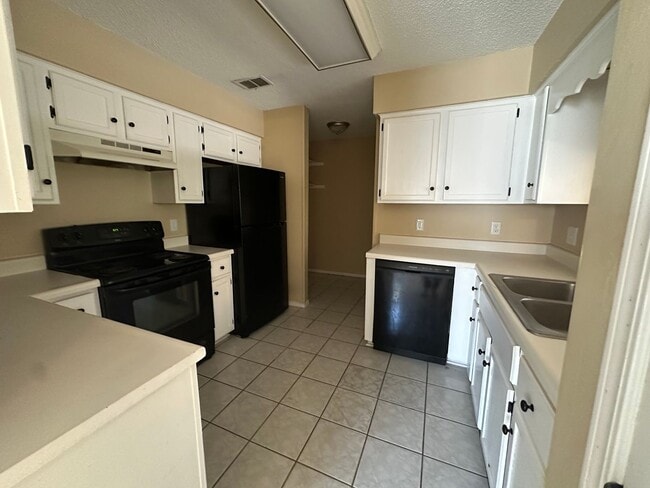 Photo - **24 hour notice to show** Welcome to this charming 3-bedroom, 2-bathroom home located in the hea...