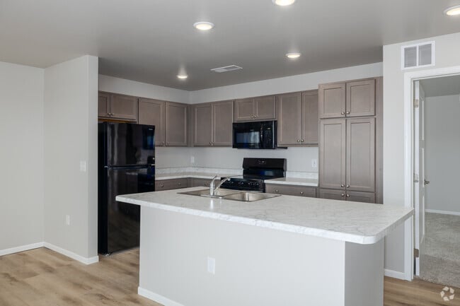 3BR, 2BA - 1,329SF - Kitchen - Mary's Heights Apartments