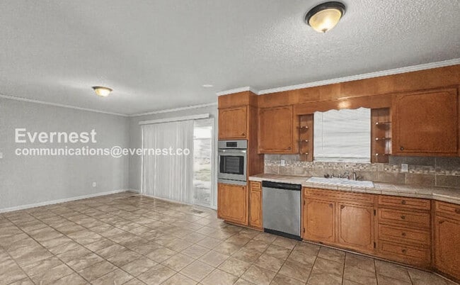 Photo - 2 Bed, 2 Bath Home with Garage / Pet-Friendly / Vouchers Accepted / Available Now!