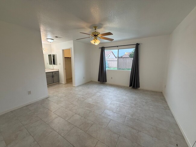 Photo - Bright 3 Bed / 2 Bath Home with Open Layout & Private Backyard