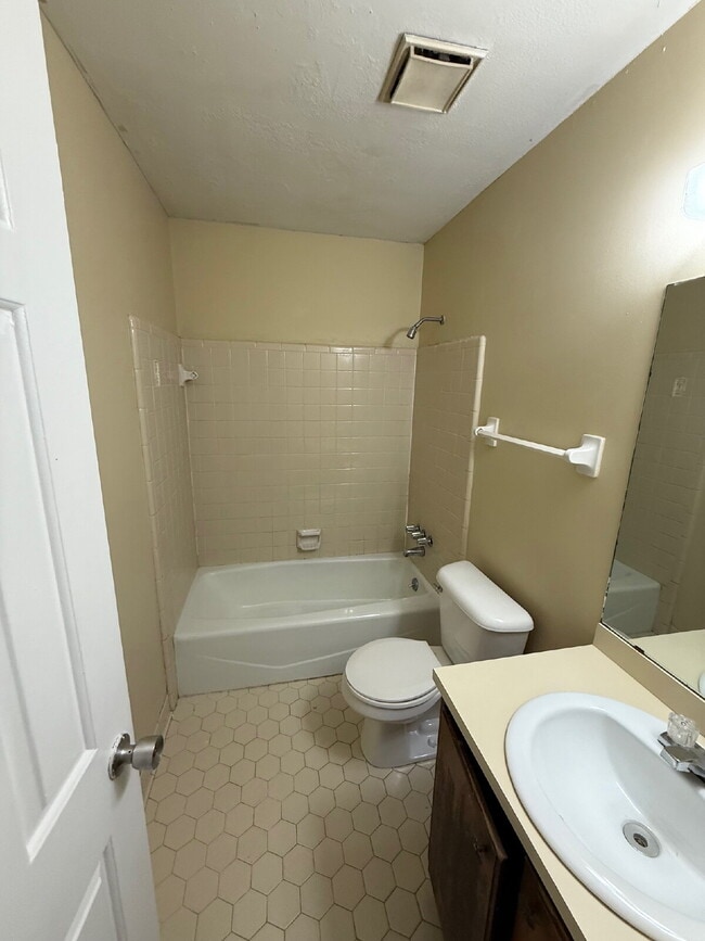 Photo - Freshly painted unit. Positioned along Navco Road, the home offers convenient access to major rou...