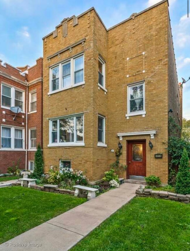 Building Photo - 5011 N Lawndale Ave Unit 2