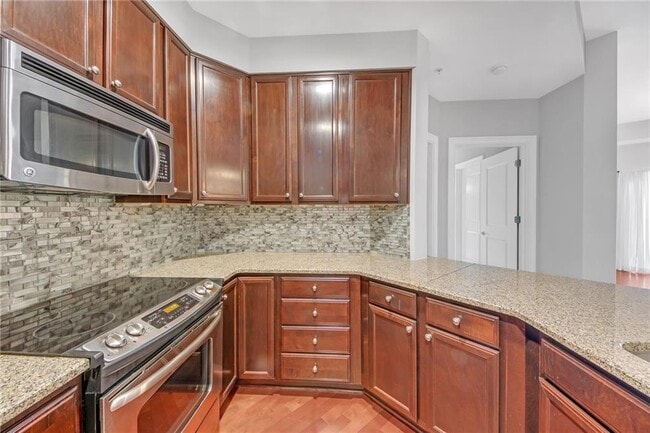 Building Photo - 200 River Vista Drive Unit 718