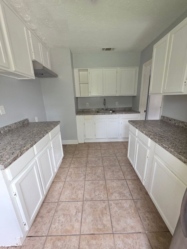 Photo - "NEW RENTAL PRICE " - BEAUTIFUL 4 BEDROOM 1 BATHROOM HOME