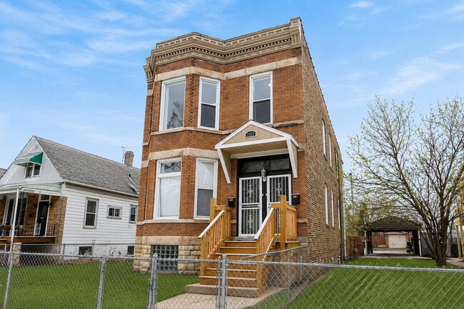 Building Photo - 7322 S Langley Ave Unit 2