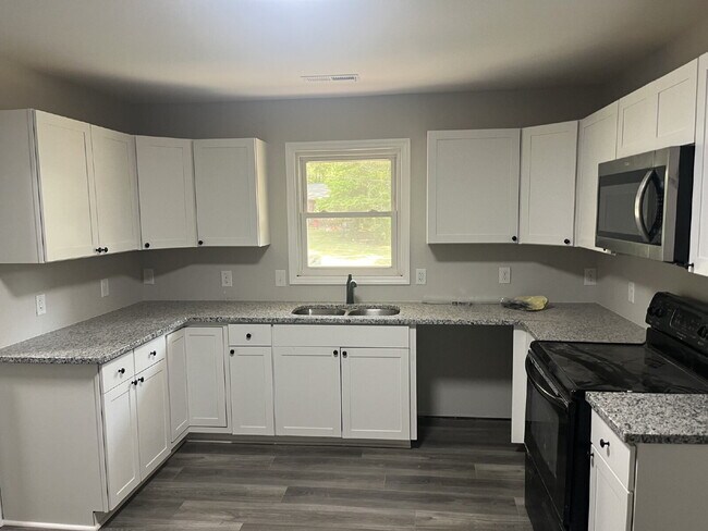 Photo - Newly Renovated 3-Bed Oasis with 2 Full Baths in Winston-Salem – Your Perfect Home Awaits!