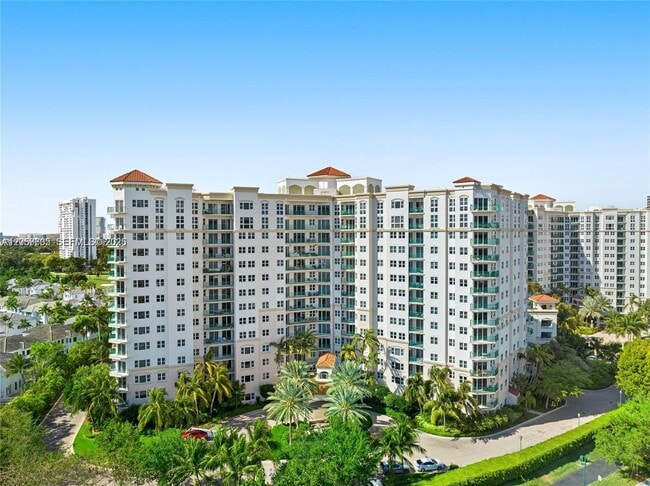 Building Photo - 19900 E Country Club Dr Unit 310