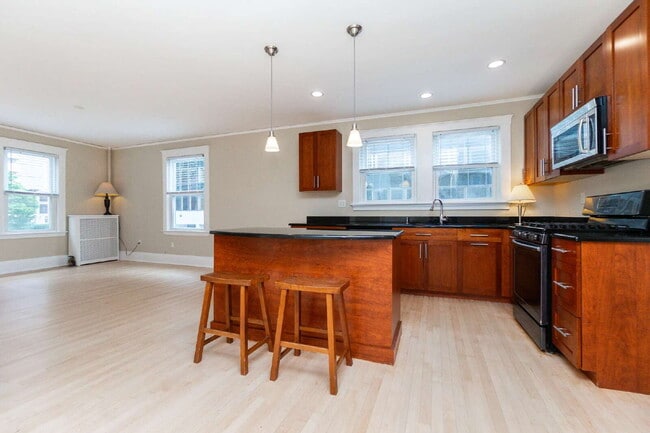 Photo - Renovated 3BR/2BA 1,278 SF In-Unit Laundry Parking Basement Storage Available Sept 1 Unit 3