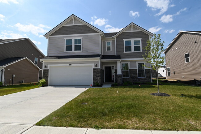 Building Photo - "Spacious 5-Bedroom Retreat with Luxurious Quartz Countertops & Fireplace on Deerberg Drive!"