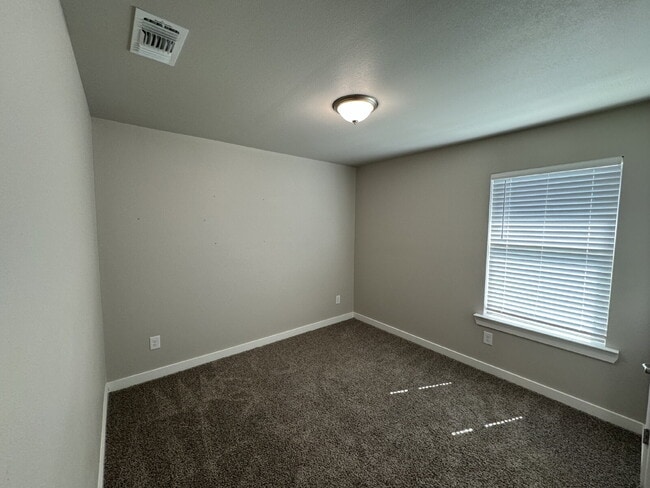 Photo - Spacious 4-bedroom, 2-bathroom Home!