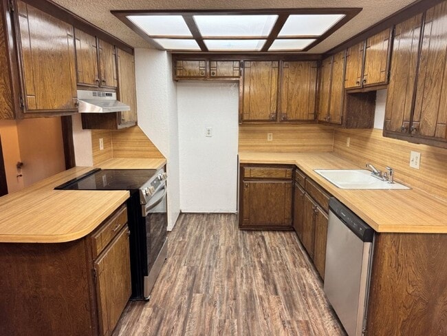 Photo - 2 bed 2 bath duplex refreshed with new flooring and bathroom countertops and paint, spacious and ...