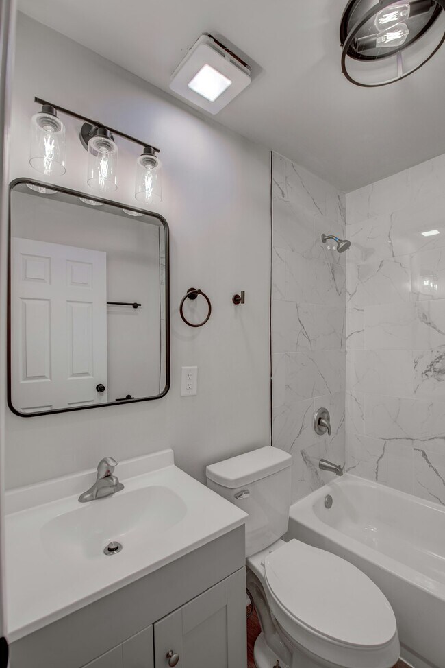 Photo - 1651 W 40th Ave
