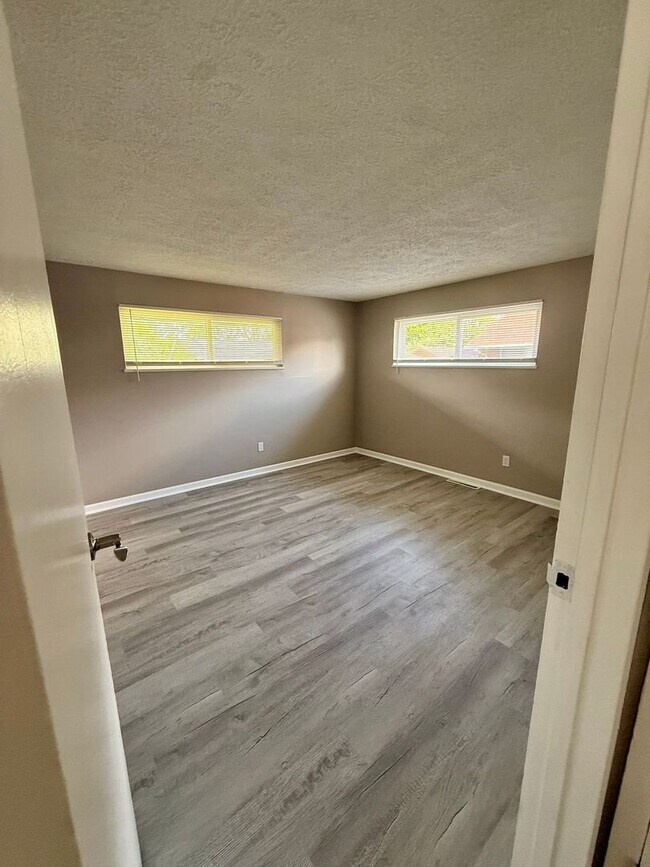 Photo - Move-In Ready 2BR with Stunning Granite + Fenced Backyard