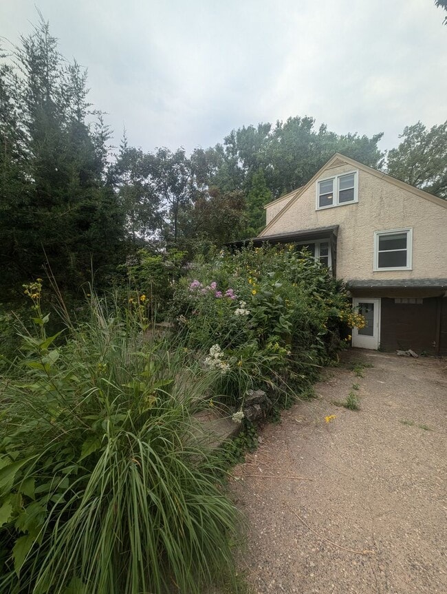 Photo - Charming Garden Oasis in West St. Paul – Fire Pit, Pond & Prime Location!