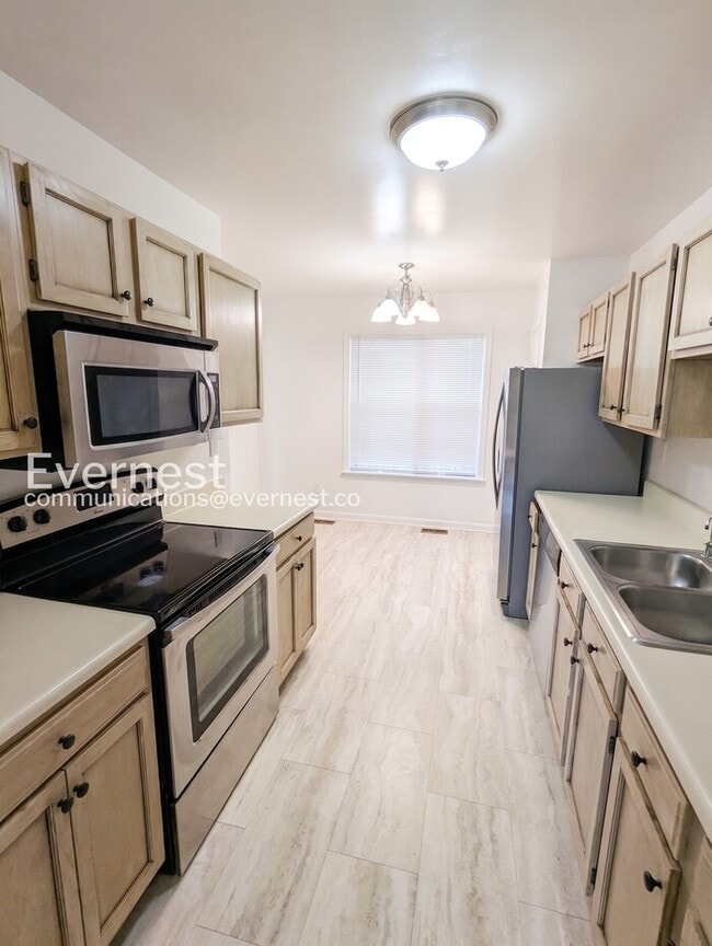 Photo - 3 Bed, 3.5 Bath Townhome with Modern Amenities / Available Soon!