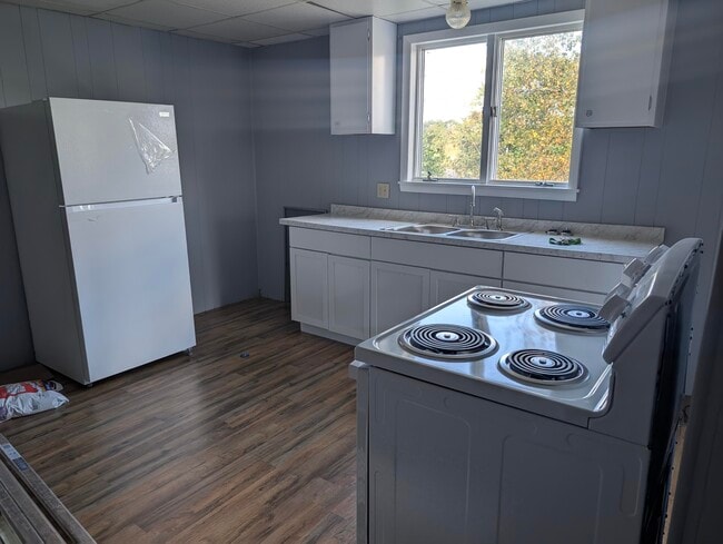 Updated kitchen with new appliances - 302 Jerome Ave Unit apt 2