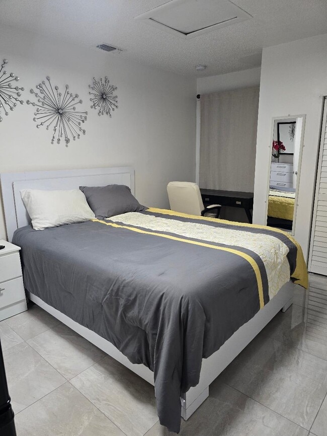 Building Photo - 8934 Grand Canal Dr Unit Private Studio / Efficiency A