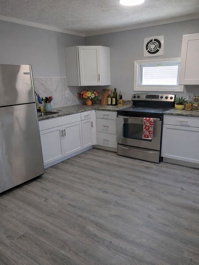 Photo - Spacious 5BR 2BA SFR w/ In-Unit W/D • Off Street Parking in Euclid