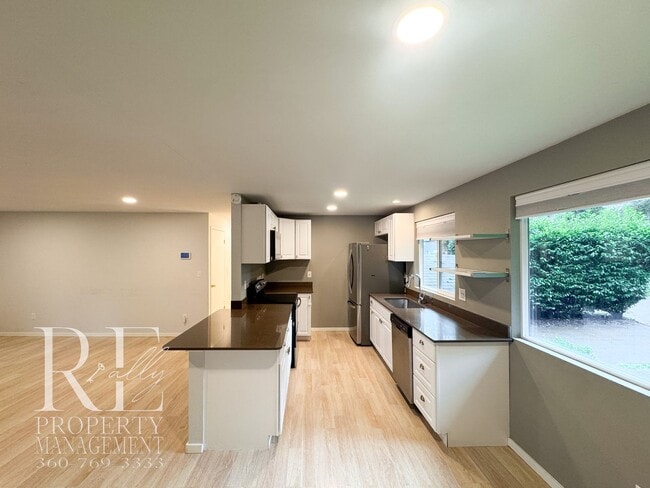 Photo - Modern Split-Level Home with Two Living Spaces & Expansive Yard in Port Orchard