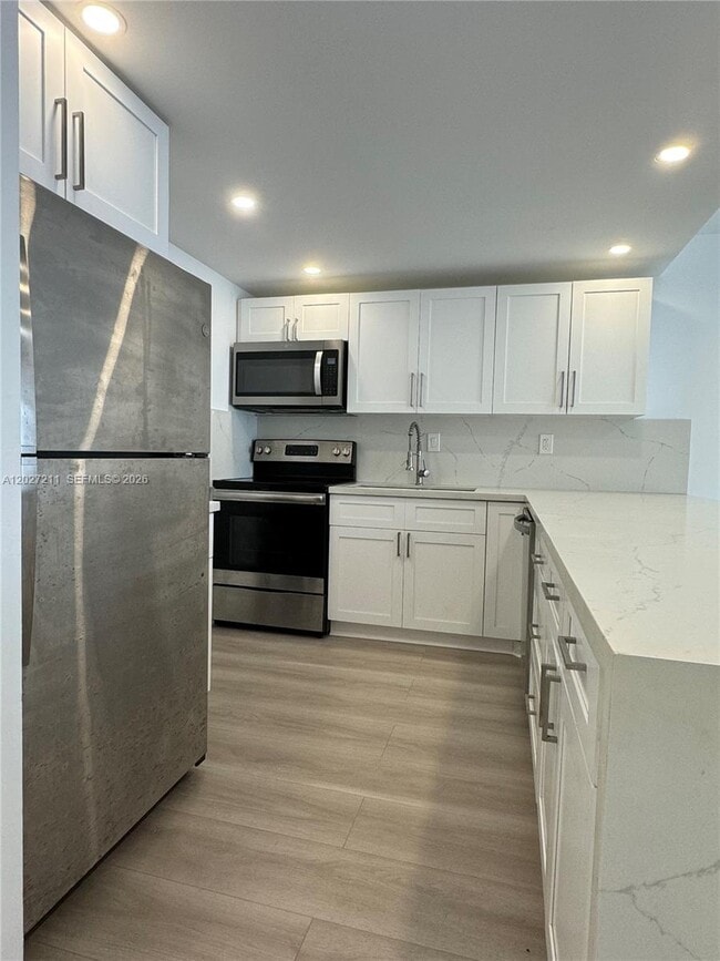 Building Photo - 16710 NE 9th Ave Unit 409