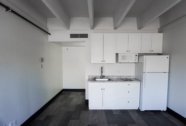 Photo - Half off First Month Rent plus a Free Ring... Unit 107