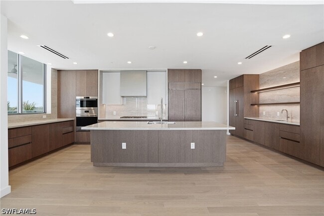 Building Photo - 5100 Seagrass Blvd Unit 201