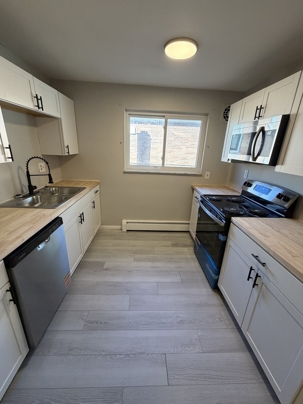 Building Photo - 6155 Ridge Ave