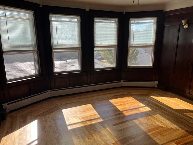 living room refinished hardwood - 61 Wall St Apartments Unit #3