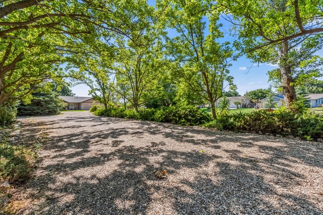 Shaded parking. Tons of shade trees. - 2971 Mumbarto Ave Unit M