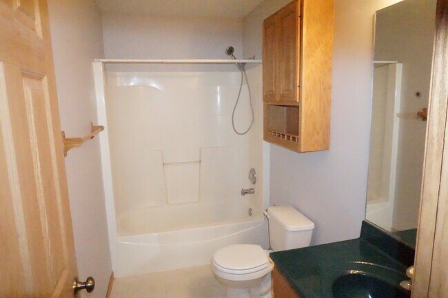 Photo - Rare find-3 Bedroom spacious corner unit with Den, 2.5 baths and 2 car garage