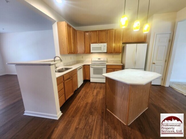 Photo - PRICE CORRECTION! Stylish Three-Level Bric...