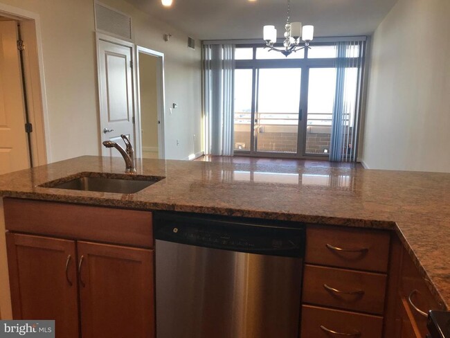 Dining and Living Area - 888 N Quincy St Condo Unit 1706