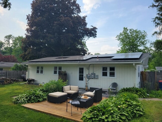 Backyard view with sample lawn furniture - 20 Princeton St